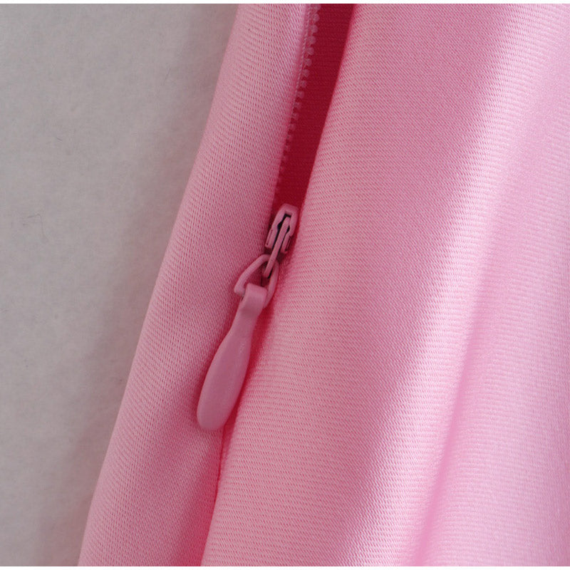 Close-up of a pink jacket with a zipper on a light gray background by millivan