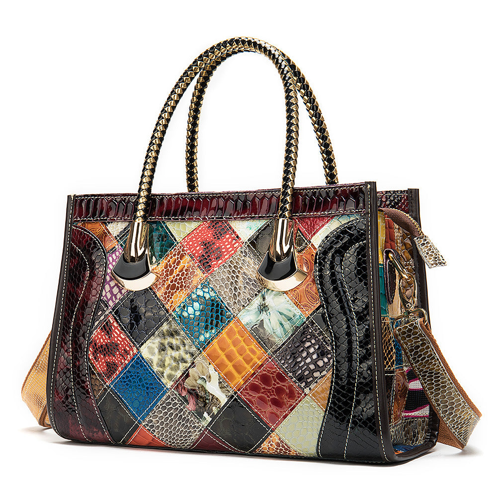 Multicolored patchwork handbag with textured patterns on a white background