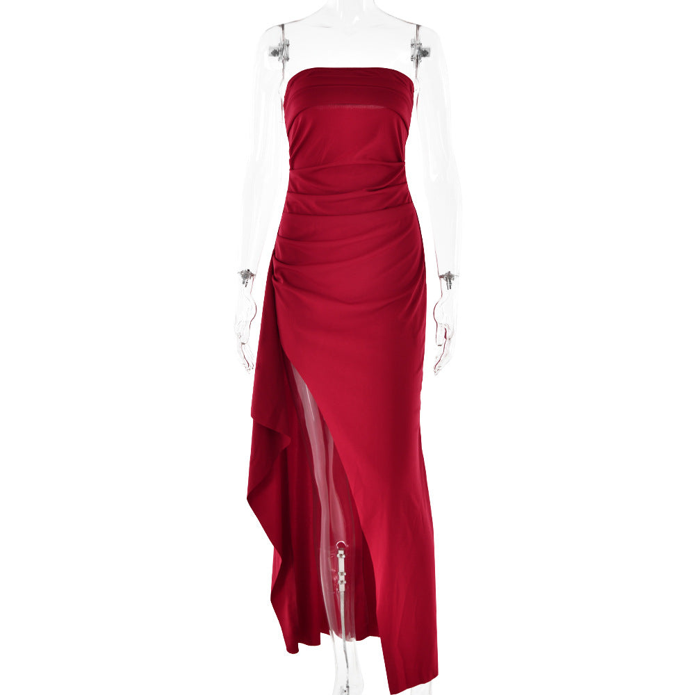 Red strapless gown on a mannequin with a white background
