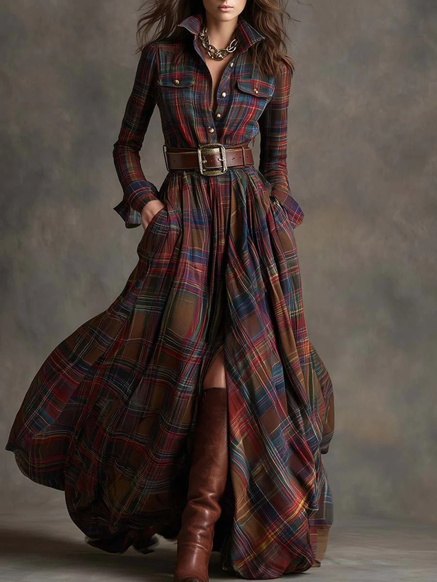 Long plaid dress with a belt and brown boots on a neutral background