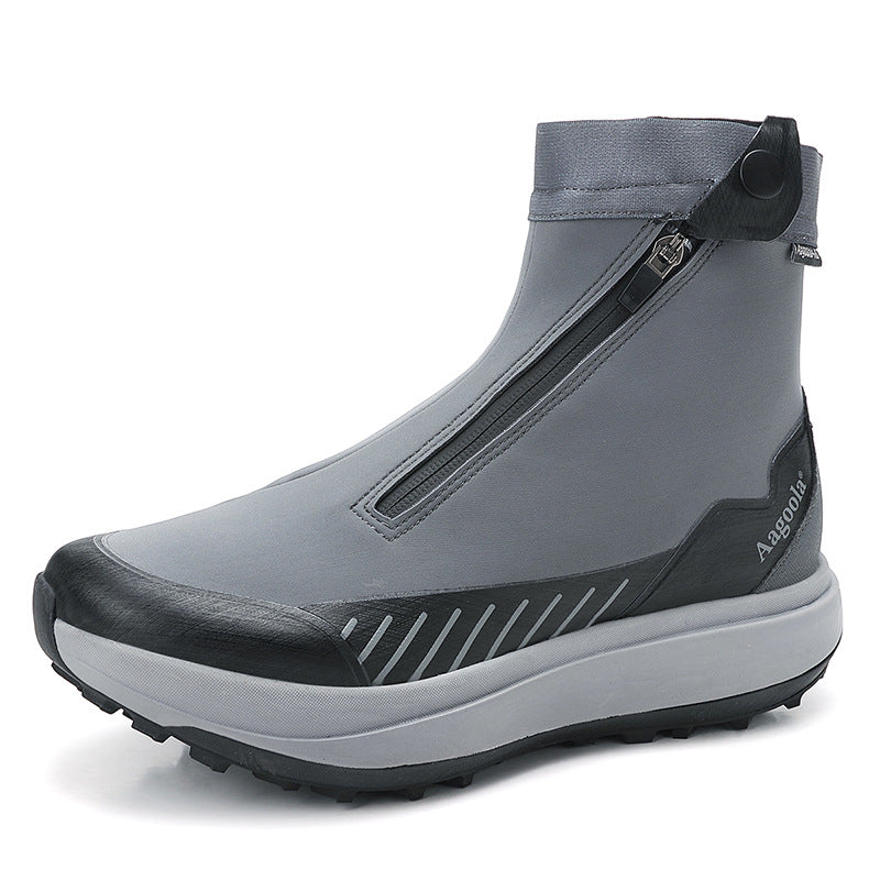 Gray ankle boot with a zipper on a white background
