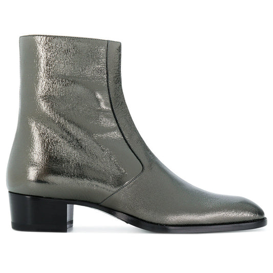 Metallic green ankle boot on a white background