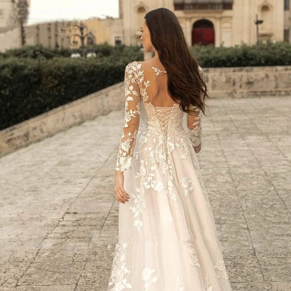 Woman in a floral dress walking away in an outdoor setting