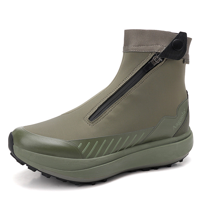 Green ankle boot with a zipper on a white background