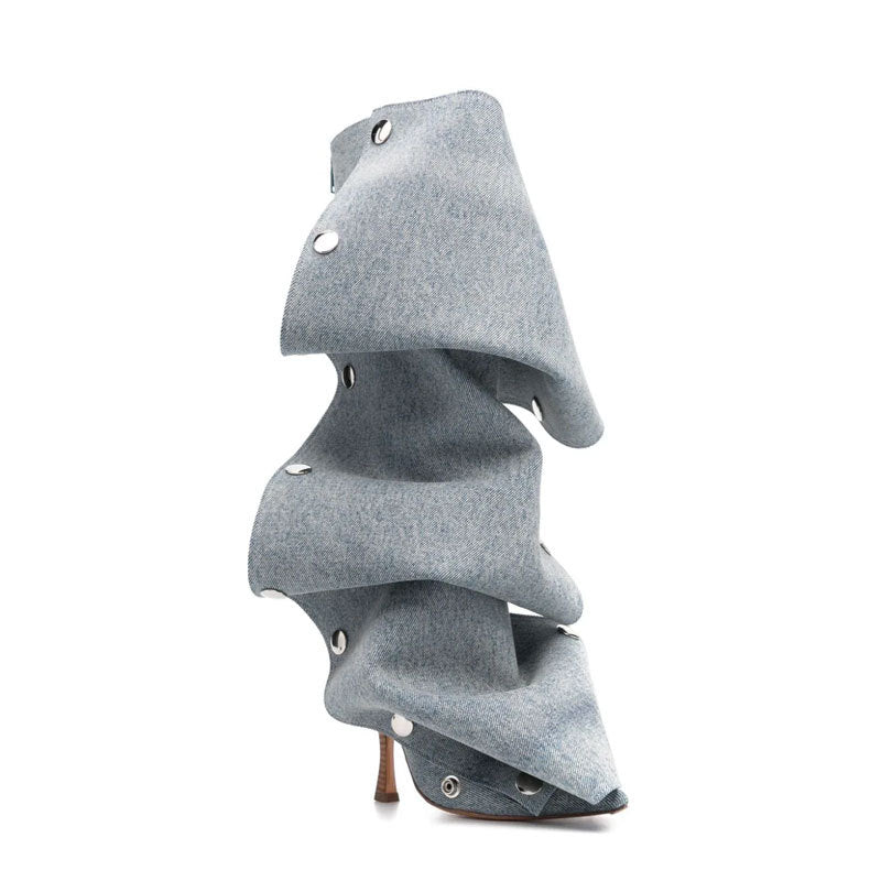 Gray fabric-covered high heel shoe on a white background