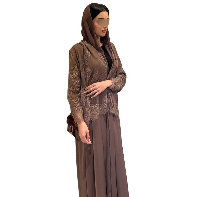Woman wearing a brown dress with a matching headscarf on a white background