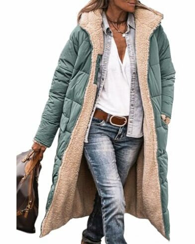 Person wearing a long green puffer coat with beige fur lining on a white background