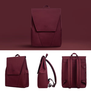 Maroon backpack shown from multiple angles on a matching background