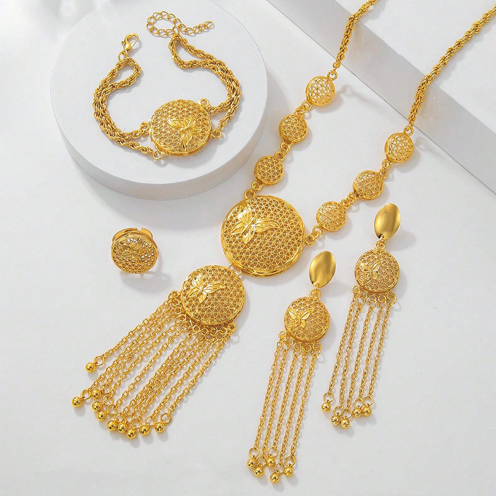 Gold jewelry set including necklace, bracelet, and ring on a white background