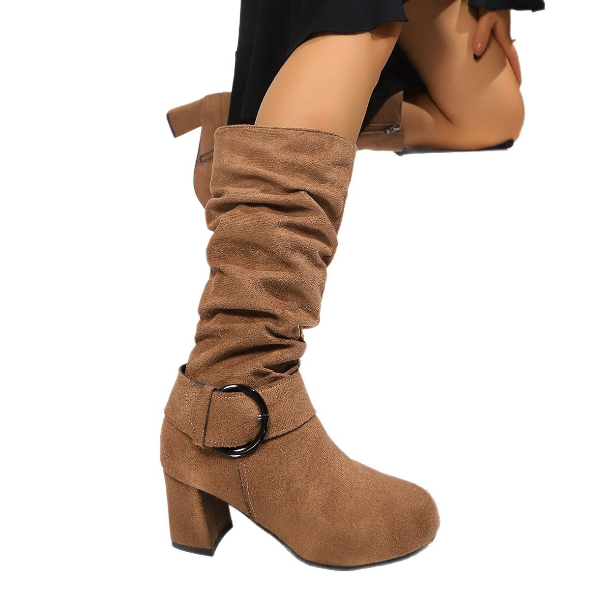 Brown knee-high boot with a buckle on a white background