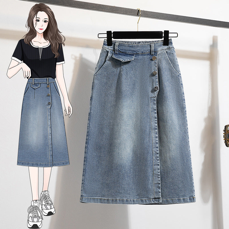 Denim skirt on a hanger with a cartoon figure wearing it.