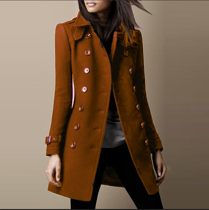 Brown coat worn by a person on a plain background