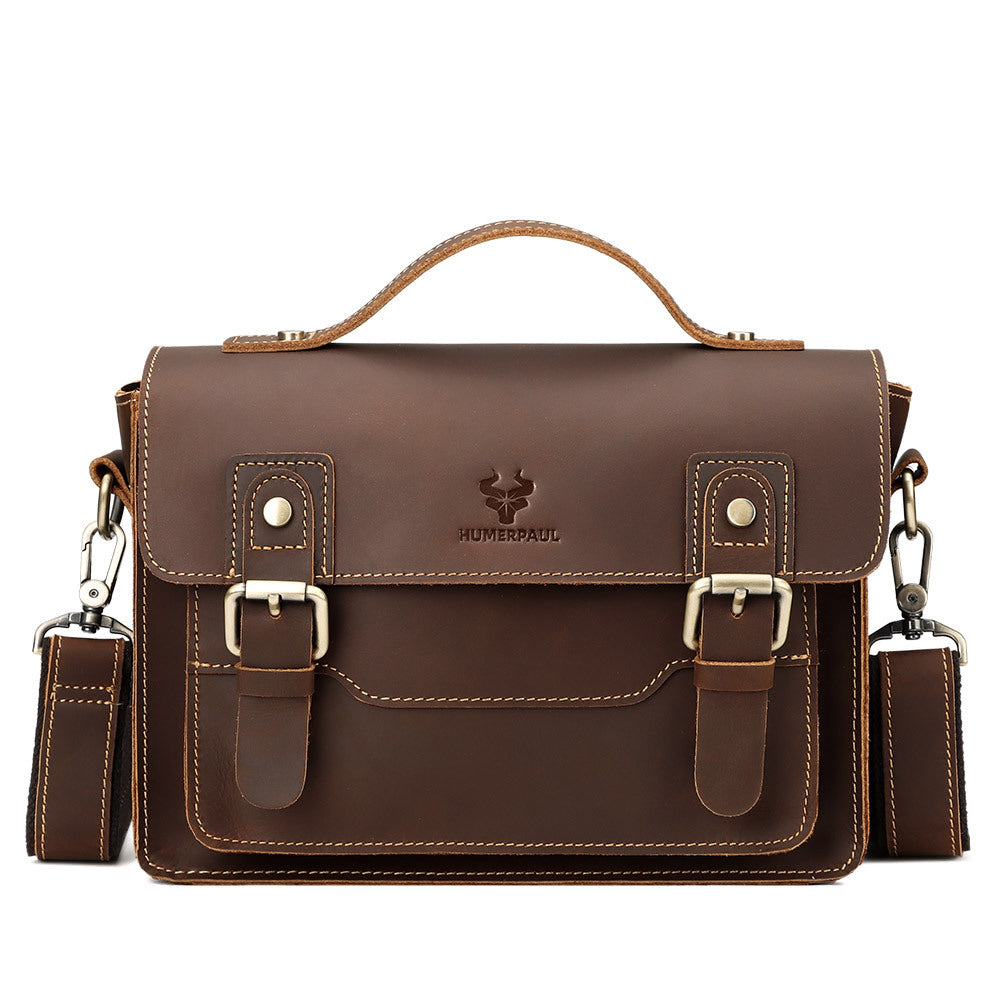 Brown leather satchel bag with a visible brand logo on a white background