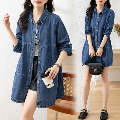 Woman wearing a denim shirt over a white top, holding a black handbag.