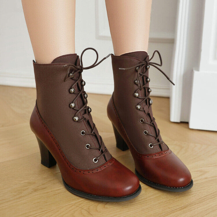 Brown lace-up boots on a wooden floor with a white wall background