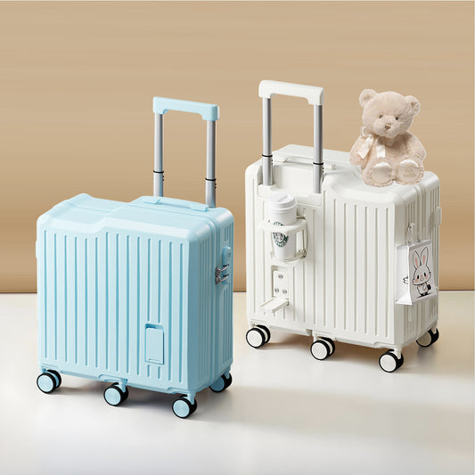 Two suitcases, one blue and one white with a teddy bear, on a beige background.