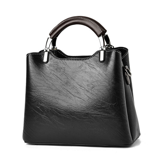Black → "La Rétro black PU retro crossbody handbag"