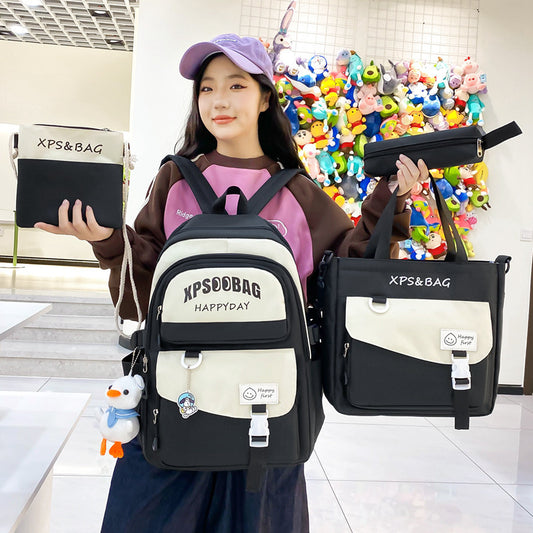 Person holding multiple bags with 'XPS&BAG' branding in a colorful indoor setting.
