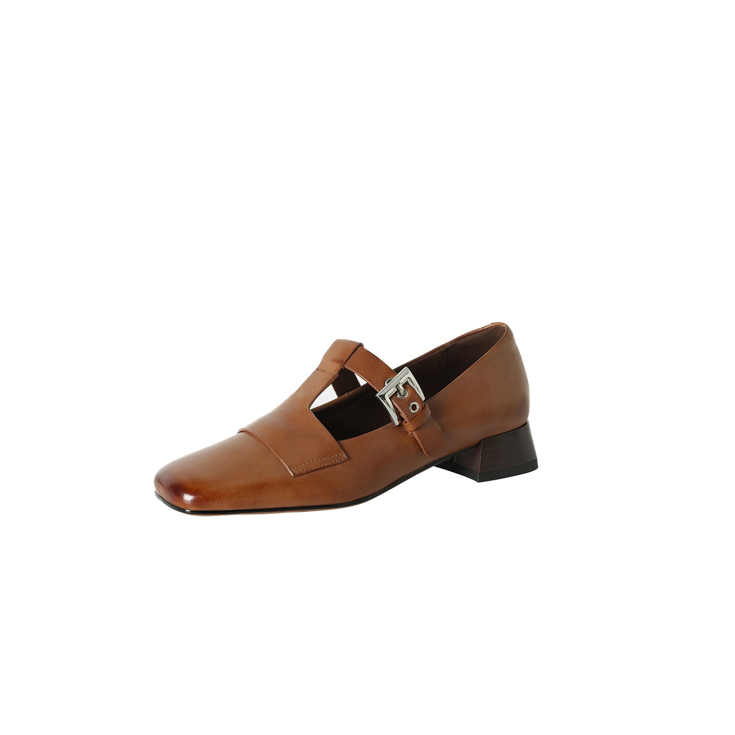 Brown leather shoe with a strap on a white background