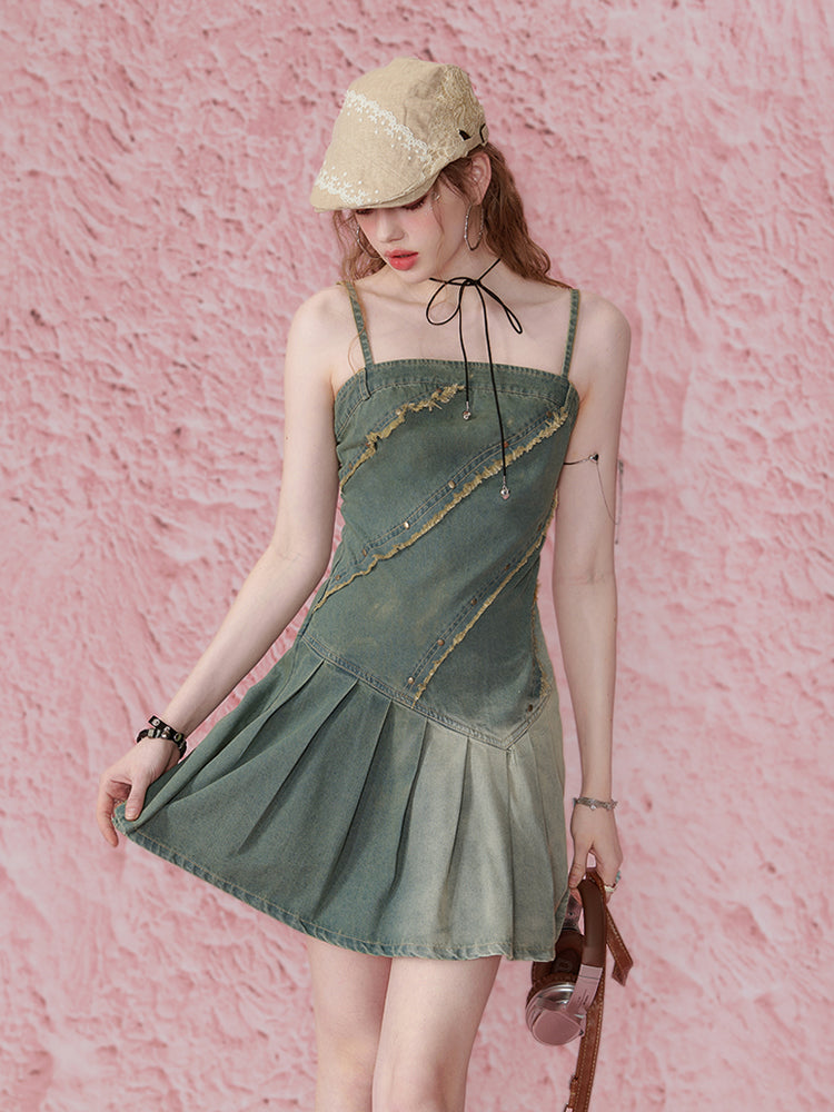 Woman wearing a green dress and beige cap against a pink textured background