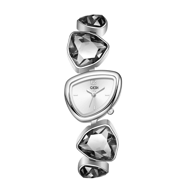 Silver watch with geometric design on a white background