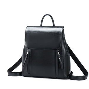 Black leather backpack on a white background