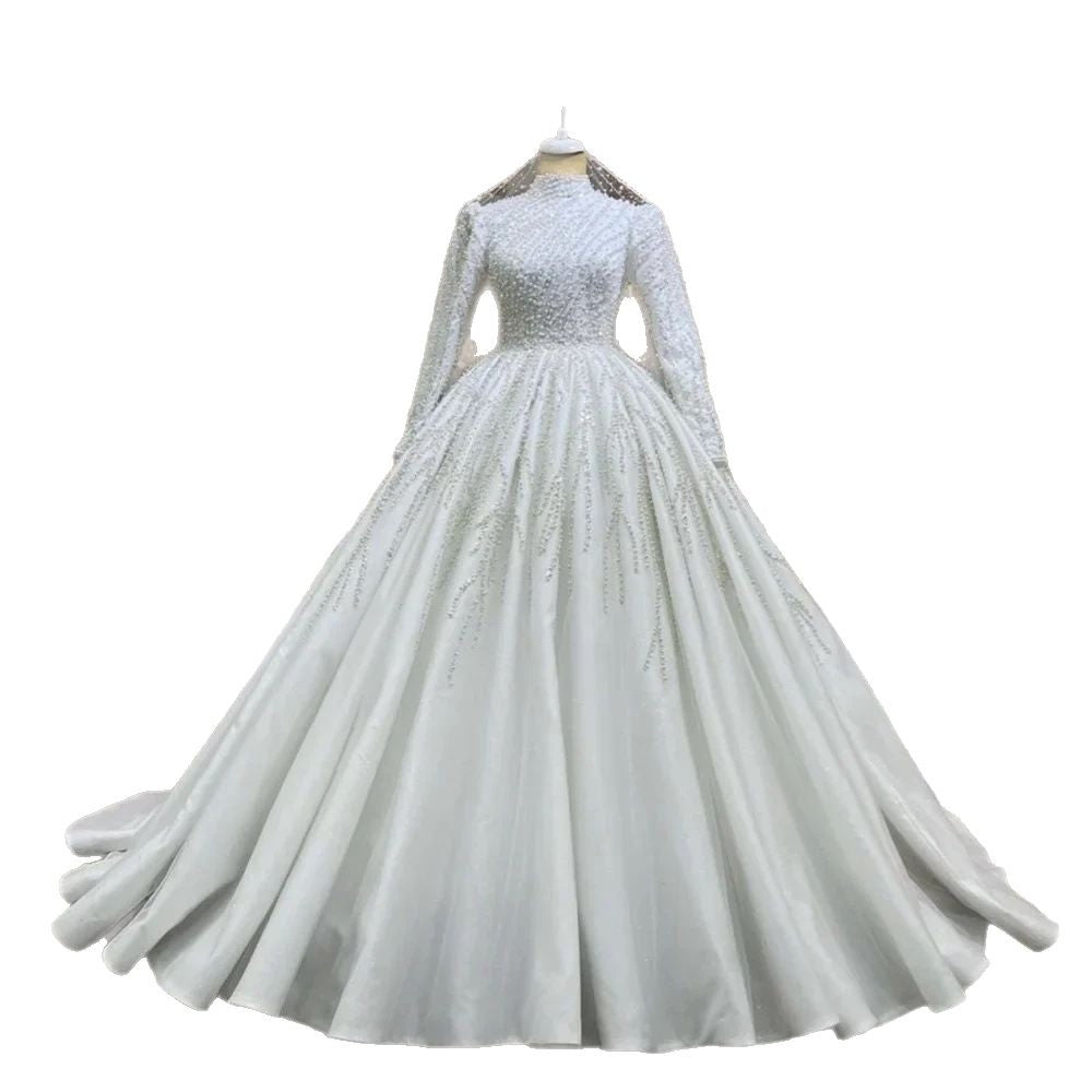 The Traîne Long Sleeve Bridal Gown