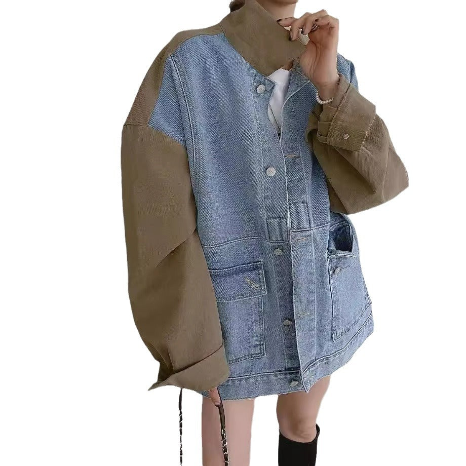 Two-tone jacket with denim and brown sections on a white background