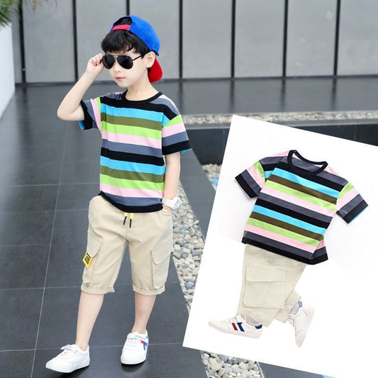 Child wearing a colorful striped shirt and beige shorts with a close-up inset of the shirt.