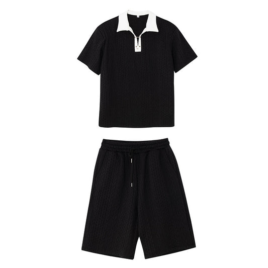 Black outfit with white collar on a white background