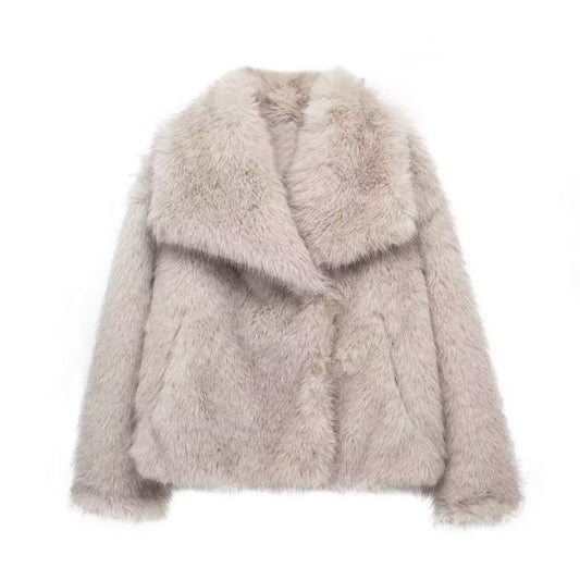 Light gray fluffy jacket on a white background