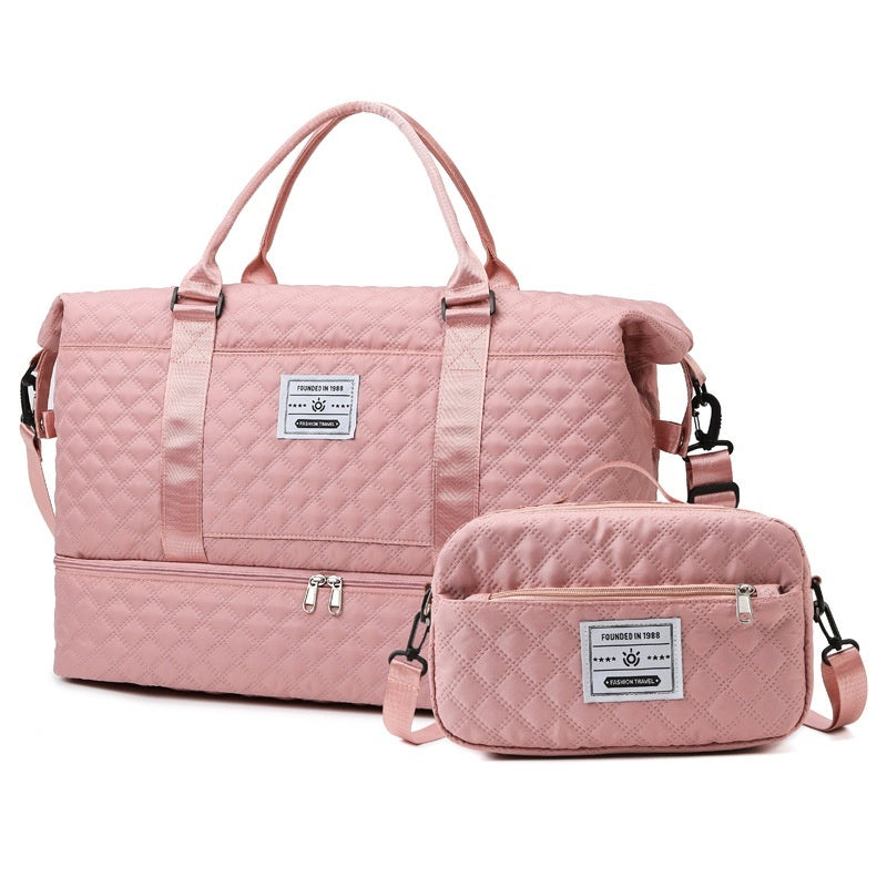 Pink quilted duffel bag with matching pouch on a white background