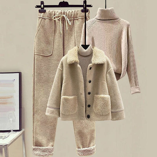 Beige winter outfit with coat, pants, and sweater on a mannequin against a neutral background.