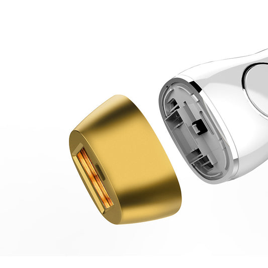 Gold and silver electronic components on a white background