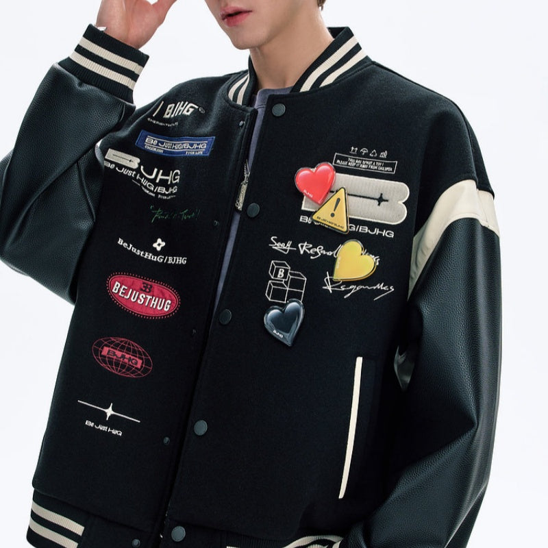 Black jacket with various patches and logos on a white background