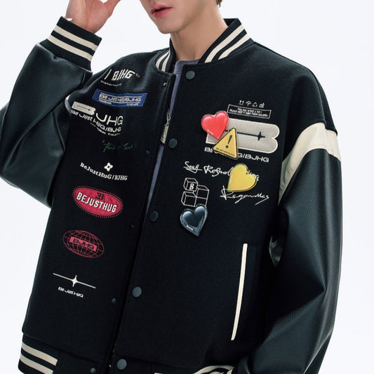 Black jacket with various patches and logos on a white background