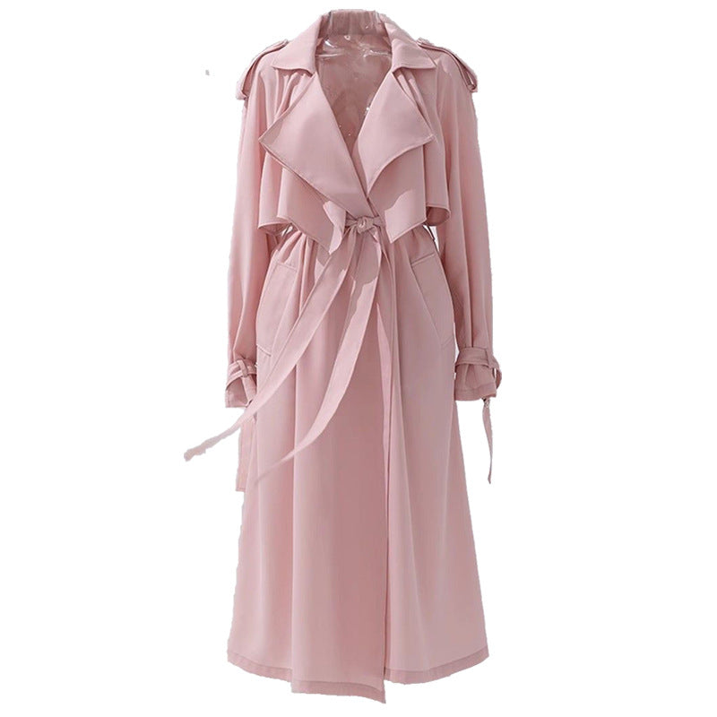 Pink trench coat on a white background