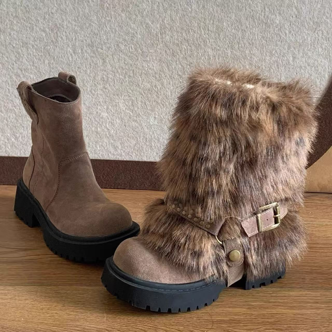 Brown suede boot with fur trim on a wooden surface