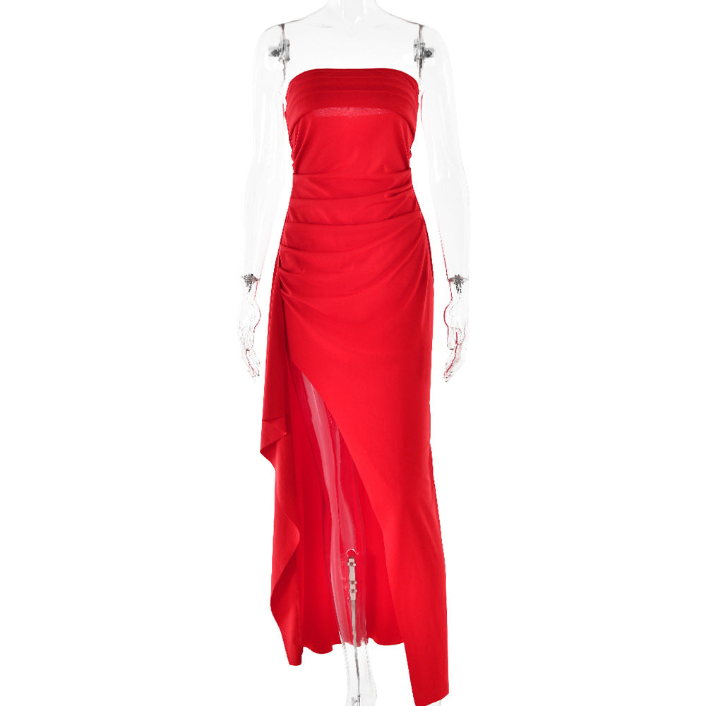 Red strapless gown on a clear mannequin against a white background